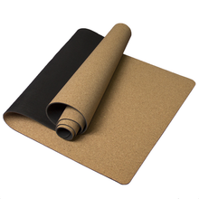 Load image into Gallery viewer, Cork exercise mat partially rolled up on white background

